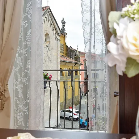 In Piazzetta سارزانا
